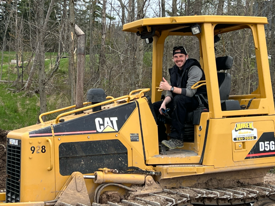 Jurek-Employee-Chris-on-Bulldozer